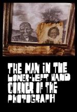The Man in the Lower-Left Hand Corner of the Photograph